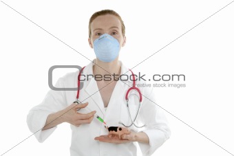 Doctor with flu vaccine syringe and toy pig