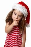 Santa girl hushing or gesturing for quiet