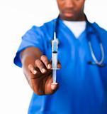 Doctor holding a syringe