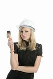 beautiful businesswoman with hammer and helmet