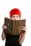 Beautiful woman, orange wig reading old book