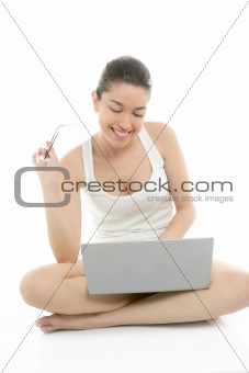 Beautiful woman on floor with laptop computer