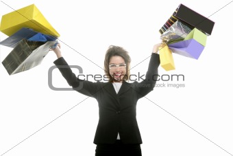 Shopaholic woman with colorful shopping bags hands