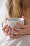 Hands Holding White Coffee Cup