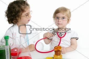 Girls pretending to be doctor in laboratory