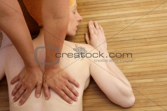 Beautiful woman receiving a back massage