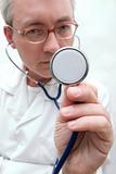 listening with stethoscope