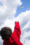 teen flying kite
