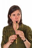 mid-age woman playing flute 