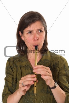 mid-age woman playing flute 