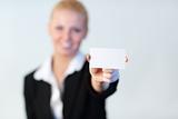 Woman holding business card