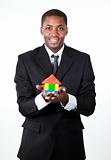 Businessman with model of house
