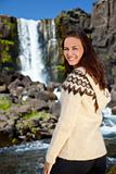 Beautiful Young Scandinavian Woman By A Waterfall