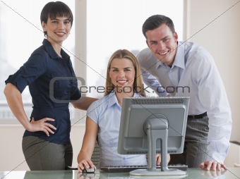 Group of people working on a computer