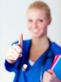 Doctor with thumb up to camera 