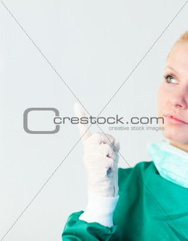 Female doctor looking upwards