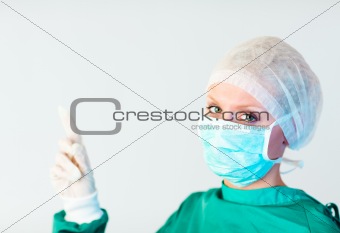 female surgeon looking upwards