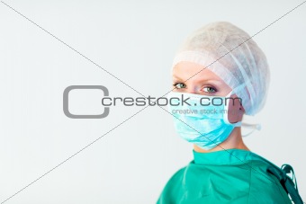 surgeon looking towards camera 