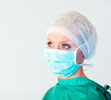 surgeon looking away from camera 