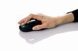 Female hand on computer mouse