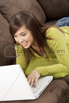 Happy Young Asian Chinese Woman Using Laptop Computer