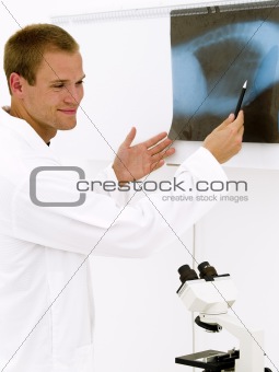 Doctor pointing at x-ray