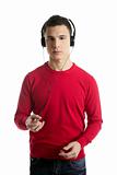 Young student boy dress in red hearing mp3 music