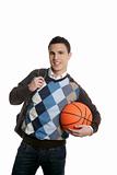 Happy young boy student with basketball ball