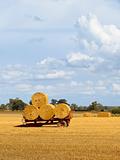 bales on red trailer