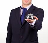 waiter holding a hotel bell