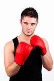 portrait of a young athletic man with boxing 