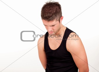 Portrait of anathletic man isolated on a white background