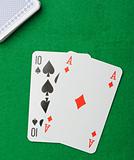 blackjack.Playing cards on a green background