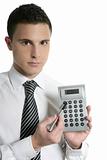 Businessman with calculator showing reports