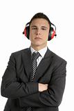 Young businessman protecting from noise