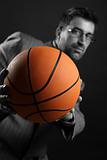 Businessman with basketball ball, teamwork, leadership