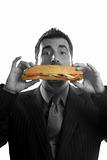 businessman eating junk sandwich food
