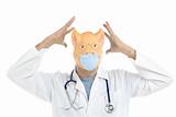 Doctor with pig mask, swine flu metaphor