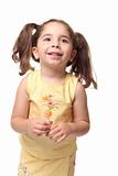 Happy smiling preschool girl in pigtails