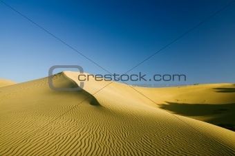 Sand dunes on the sunset