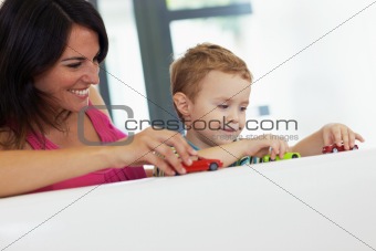 mom and child playing