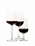 Three glasses of red wine isolated on white background