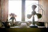 Antique vintage air fan, doll and phone