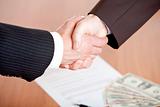 BUSINESS HANDSHAKE AFTER CONTRACT  Signature