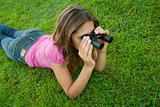 Woman binocular lenses grass