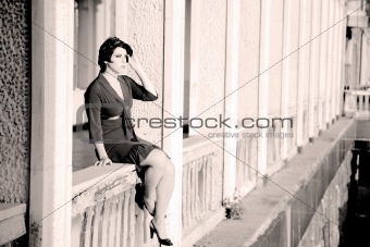 Woman On A Balcony
