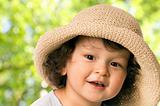 The child in a straw-hat.
