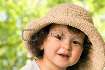 The child in a straw-hat.