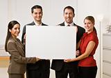 Business people holding blank paper