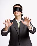 Businessman in blindfold